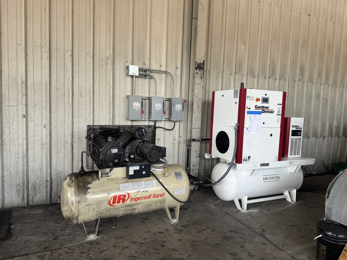 Reciprocating and rotary screw compressors installed side by side