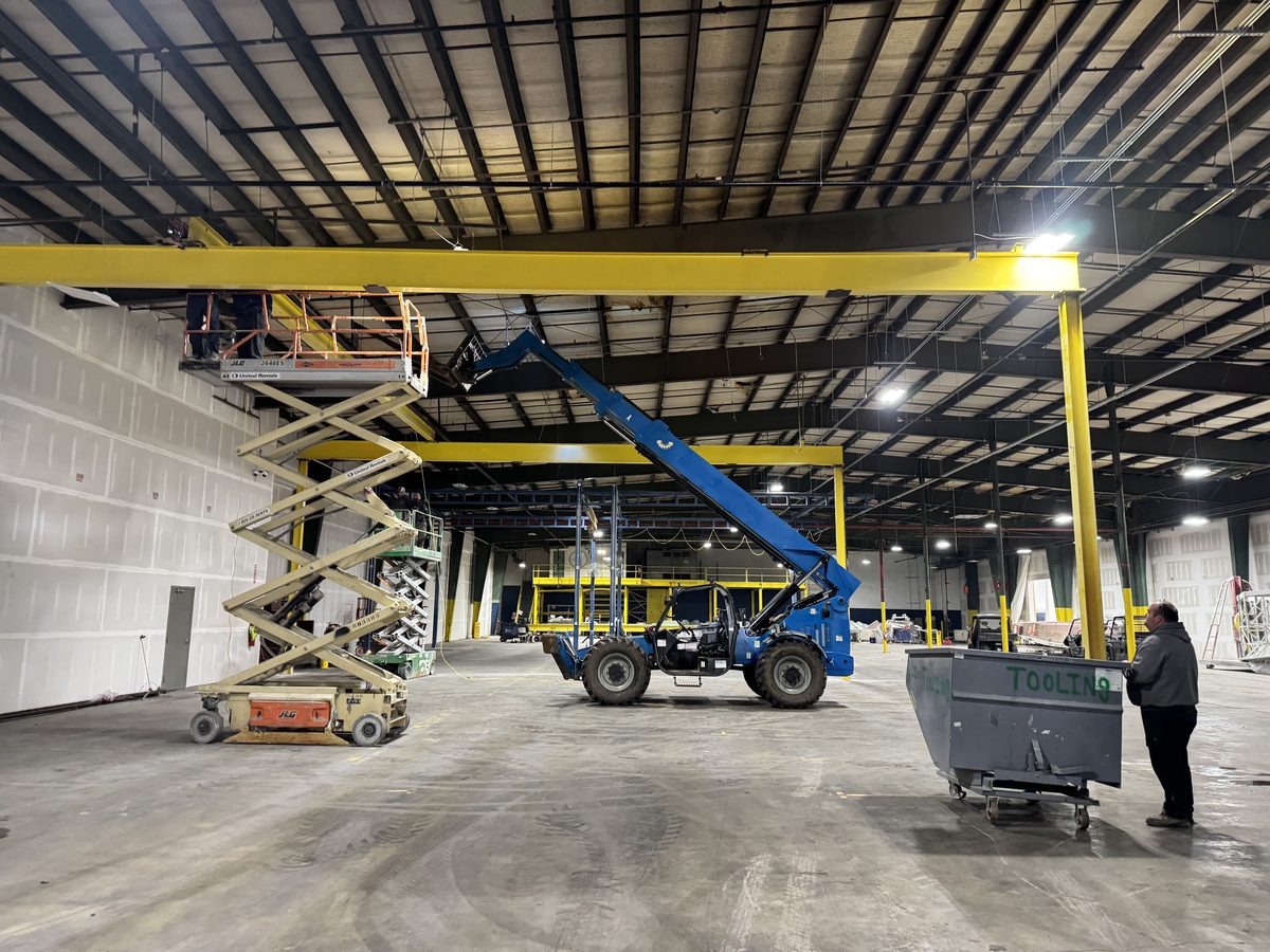 Lifts positioned for overhead piping and lighting installation