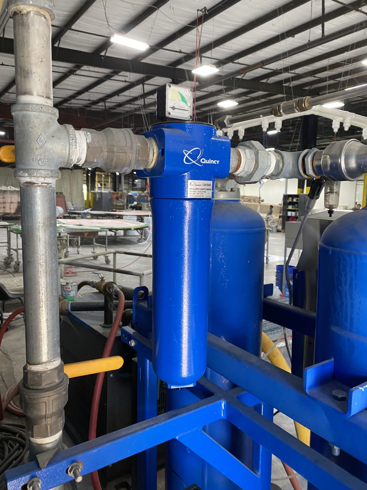 Industrial process piping with isolation valves and filtration vessels